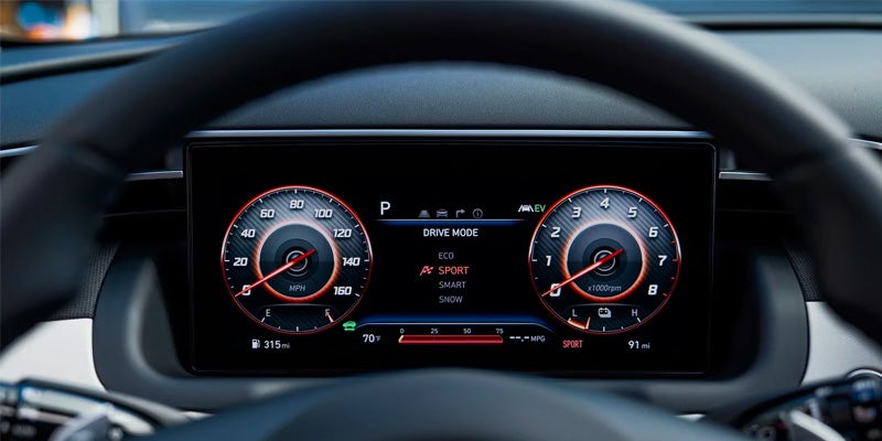 A computer monitor featuring the Hyundai website, models, promotional content.