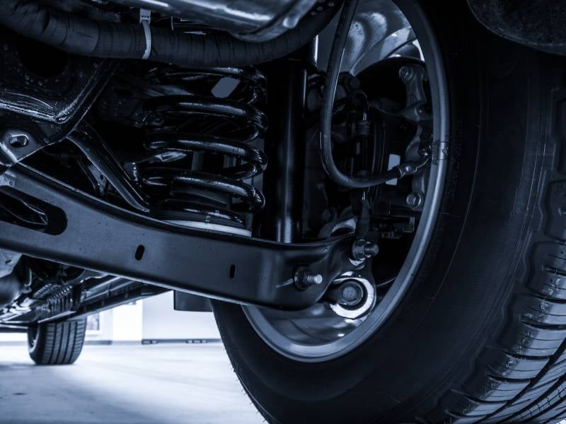 Mack Grubbs Hyundai in Hattiesburg MS close up of suspension on the right rear tire of a car